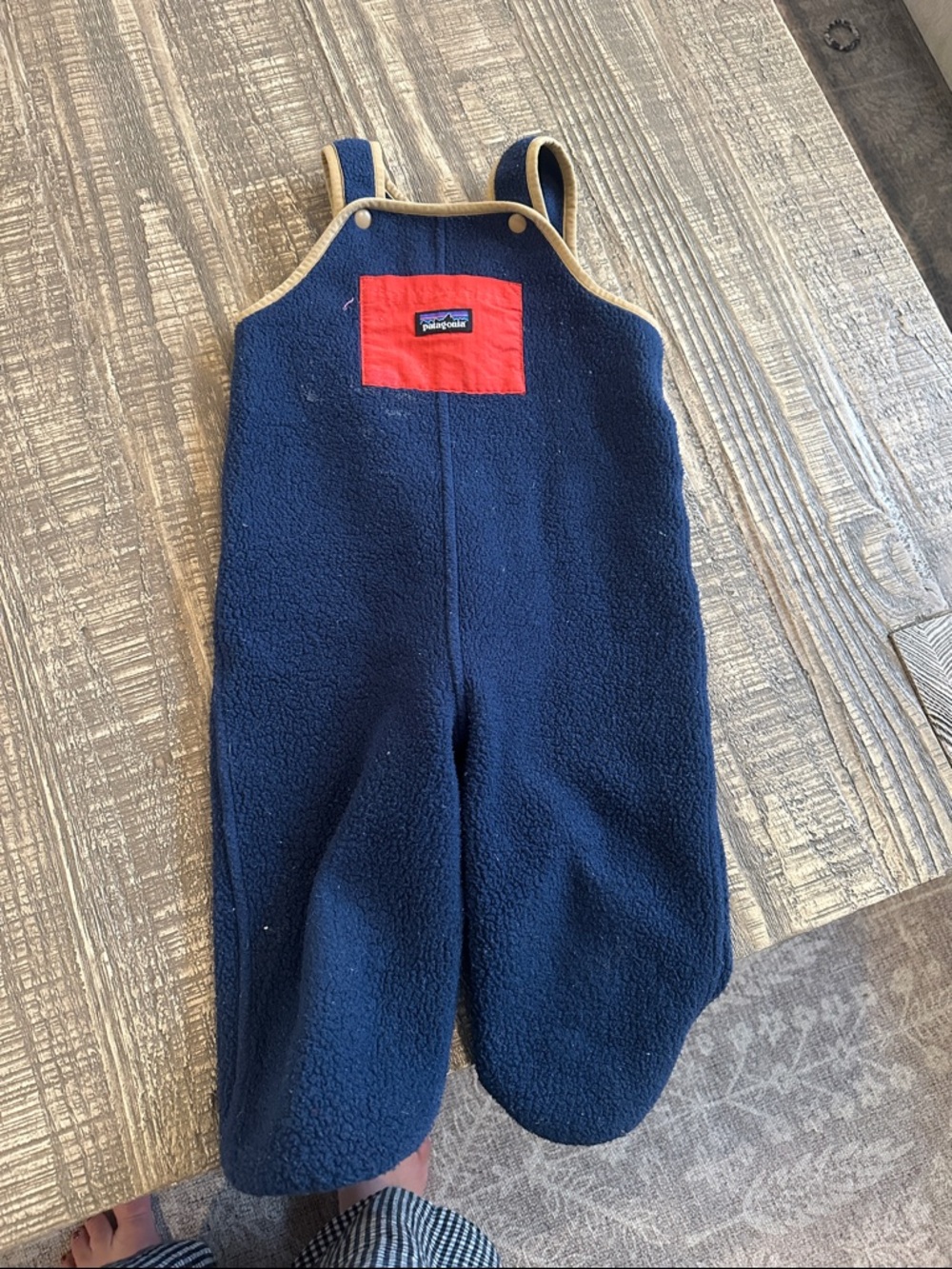 Patagonia Navy Fleece Overalls with Red Chest Patch